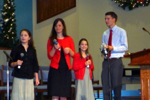 2015-11-29 Susanna, Priscilla, Phebe, Luke @ Carols Concert